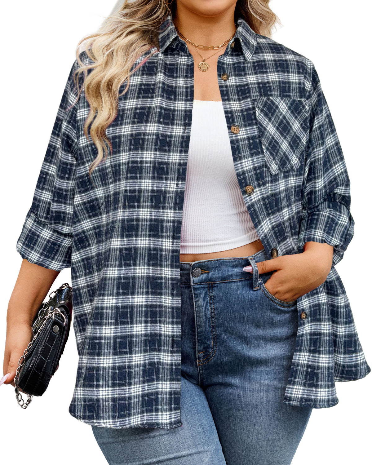 Model wearing a navy blue and white plaid button-up shirt over a white top with blue jeans.